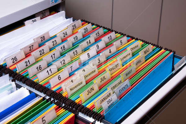 Faliszekrény iratok mappák archívum színek számok Stock fotó © ajfilgud