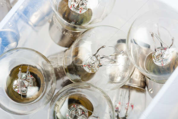 Becuri plastic cutie grup lampă Imagine de stoc © ajfilgud