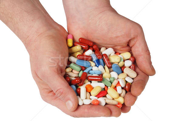 Hände Pillen voll Medizin isoliert weiß Stock foto © ajt