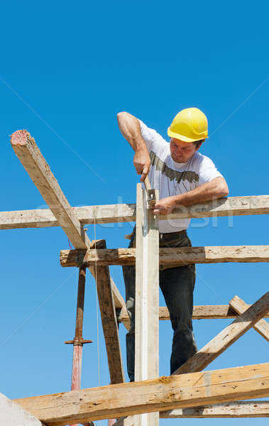 Construction worker on scaffold Stock photo © akarelias