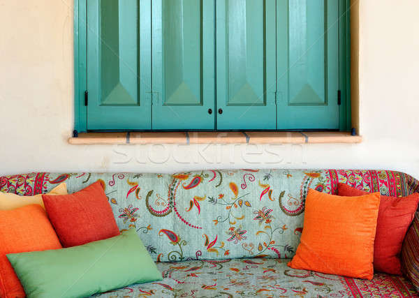 Sofa in the porch of a Greek island house Stock photo © akarelias
