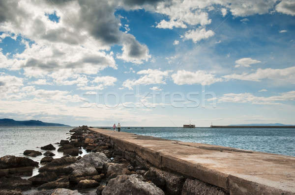 Romantic walk on the pier Stock photo © akarelias