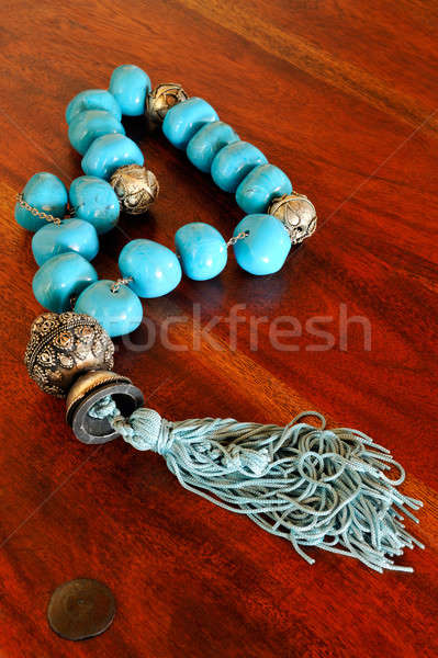 Old chaplet with turquoise beads Stock photo © akarelias