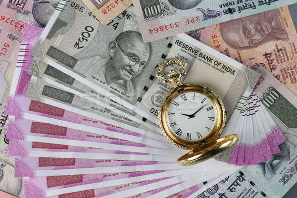 New Indian Rupees Currency with antique time watch Stock photo © Akhilesh