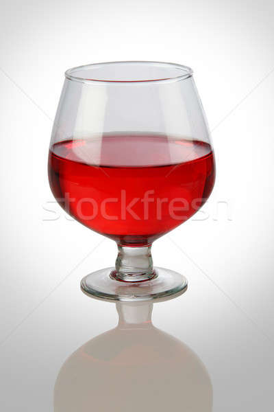 Red Wine Glass on White Reflective Background Stock photo © Akhilesh