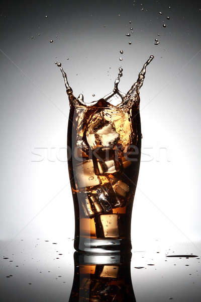 Agua alcohol bebida fría Splash vidrio Foto stock © Akhilesh