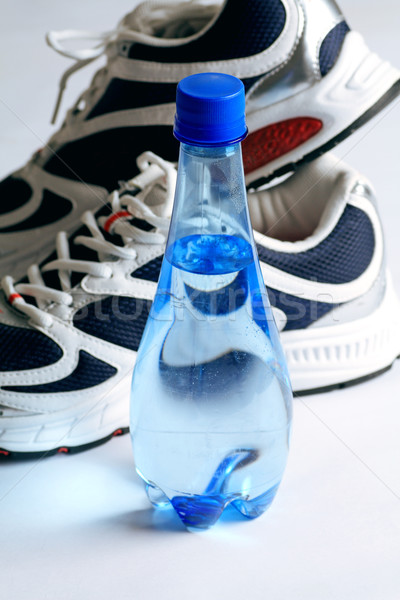 Sportowe buty manierka pić butelki moc Zdjęcia stock © Akhilesh