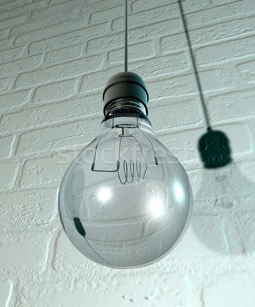 Hanging Light Bulb And Fitting On A Wall Stock photo © albund