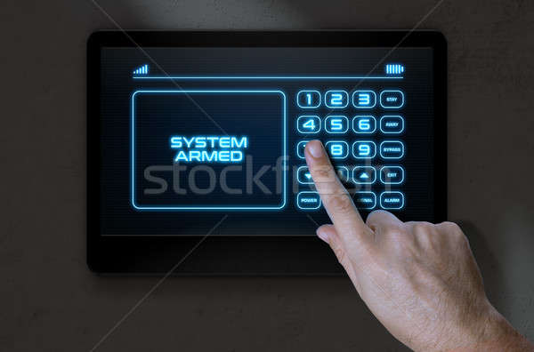Hand Pressing Modern Home Security Stock photo © albund