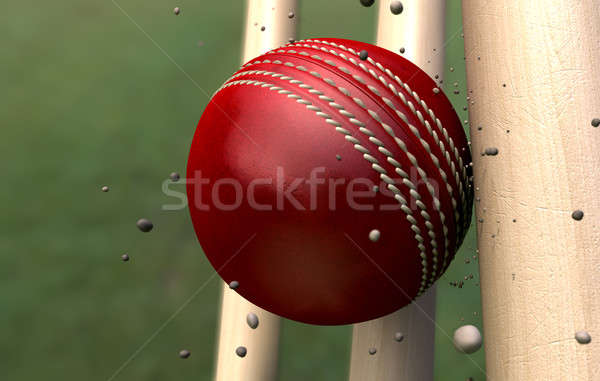 Cricket Ball Striking Wickets With Particles Stock photo © albund