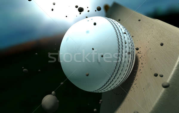 Cricket Ball Striking Bat With Particles At Night Stock photo © albund