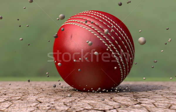 Cricket Ball Striking Ground With Particles Stock photo © albund