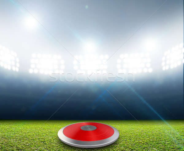 Discus In Generic Floodlit Stadium Stock photo © albund