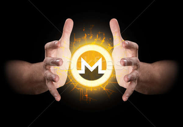 Hands Grasping Cryptocurrency Stock photo © albund