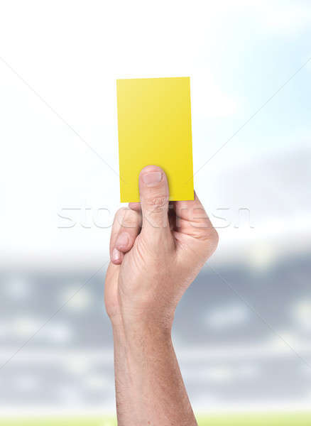 Yellow Card On Stadium Background Stock photo © albund