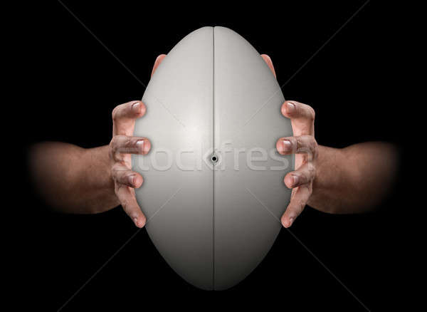 Manos agarrar pelota de rugby par masculina aislado Foto stock © albund