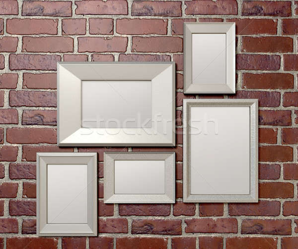 Blank Picture Frames On A Wall Front Stock photo © albund