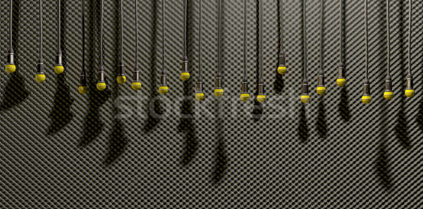 Microphones Dangling On Sound Proof Acoustic Foam  Stock photo © albund