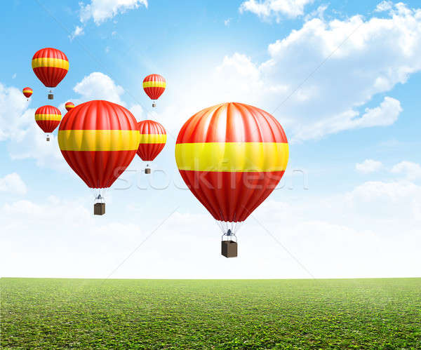 Hot powietrza balony zielona trawa kolekcja czerwony Zdjęcia stock © albund