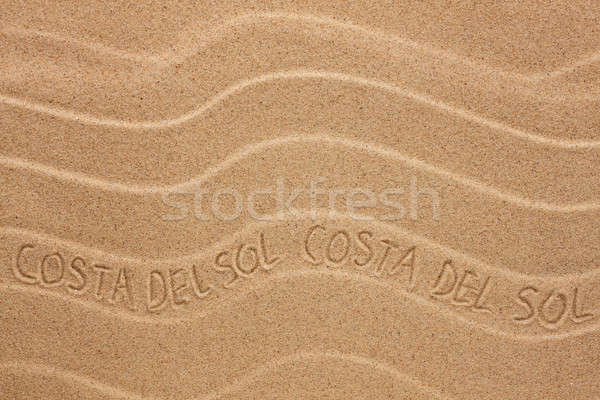 Costa del Sol inscription on the wavy sand Stock photo © alekleks