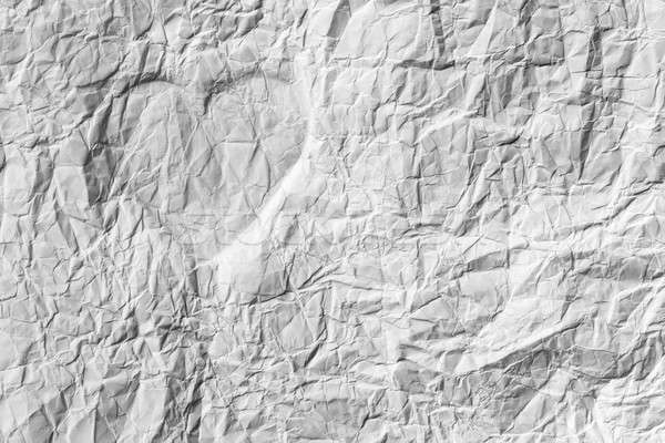 Silhouette of the heart on a white crumpled paper Stock photo © alekleks