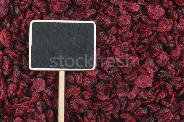 Pointer, the price tag lies on cranberry Stock photo © alekleks