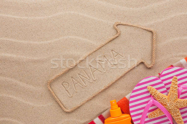 Panama pointer and beach accessories lying on the sand Stock photo © alekleks