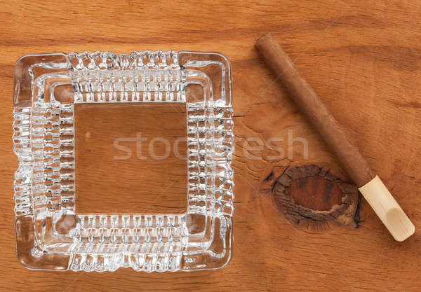Glass ashtray with cigar  on a wooden surface Stock photo © alekleks