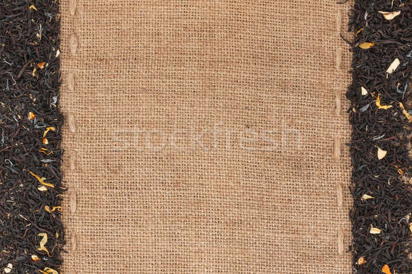 Black tea with additives lies on sackcloth Stock photo © alekleks