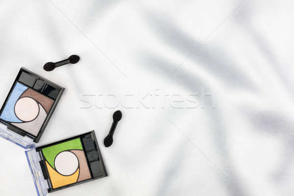 Beautiful picture of cosmetic  on white satin Stock photo © alekleks