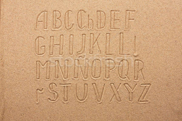 Spain alphabet  written on the sand Stock photo © alekleks