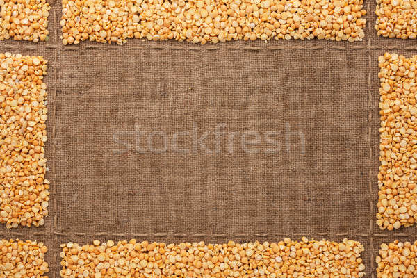 Stock photo: Beautiful frame with peas on sackcloth