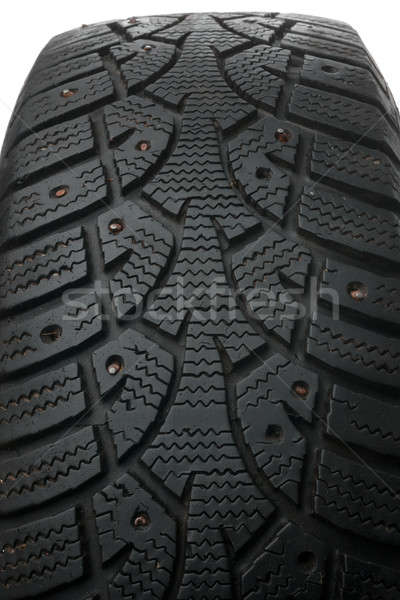 Old winter studded tire Stock photo © alekleks