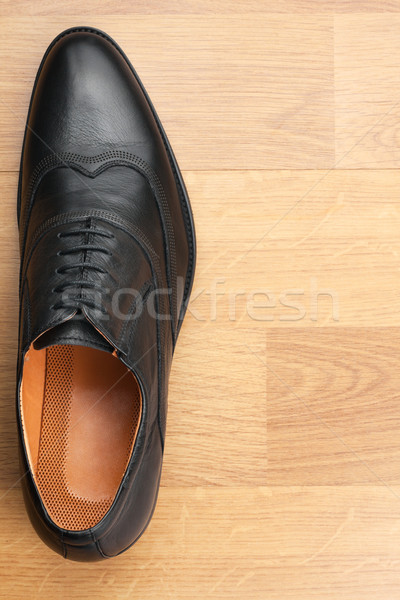 Classic mens shoes stand on the wooden floor Stock photo © alekleks
