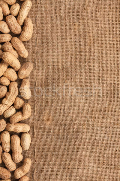 unpeeled peanuts lying on burlap  Stock photo © alekleks