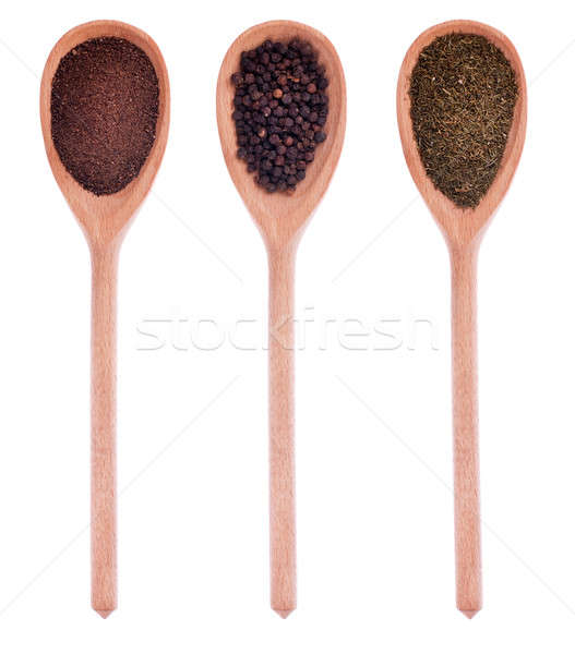 Pepper, black pepper, dried dill in three wooden spoons Stock photo © alekleks