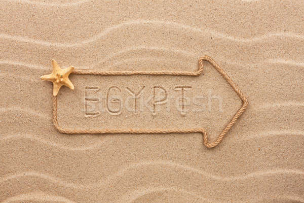 Arrow made of rope and sea shells with the word Egypt  on the sa Stock photo © alekleks