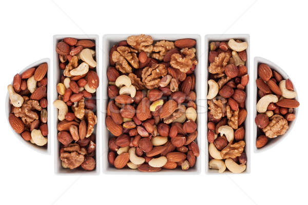 Nuts in the ceramic bowl Stock photo © alekleks