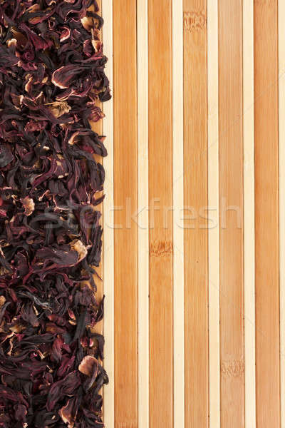 Dried hibiscus on a bamboo mat Stock photo © alekleks