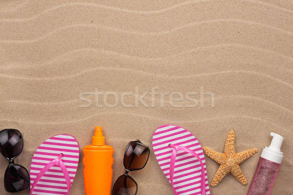 Accessories for the beach  lying on the sand Stock photo © alekleks