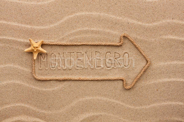 Arrow made of rope and sea shells with the word Montenegro on th Stock photo © alekleks