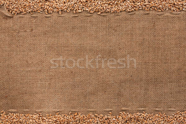 Stock photo: wheat lying on sackcloth 