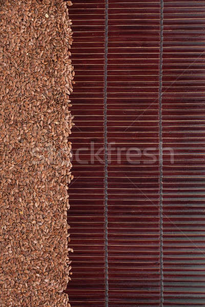 Flax seed  on a dark  bamboo mat Stock photo © alekleks