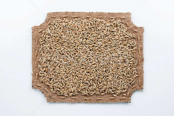 Figured frame made of burlap and  rye  grains Stock photo © alekleks