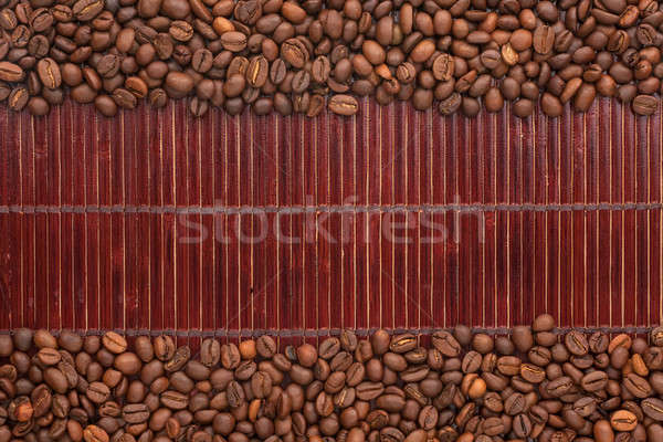 Coffee beans lying on a bamboo mat Stock photo © alekleks