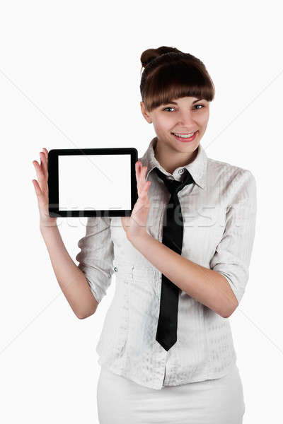 Beautiful businesswoman keeps the tablet Stock photo © alekleks