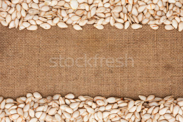 Pumpkin seeds were lying on sackcloth Stock photo © alekleks