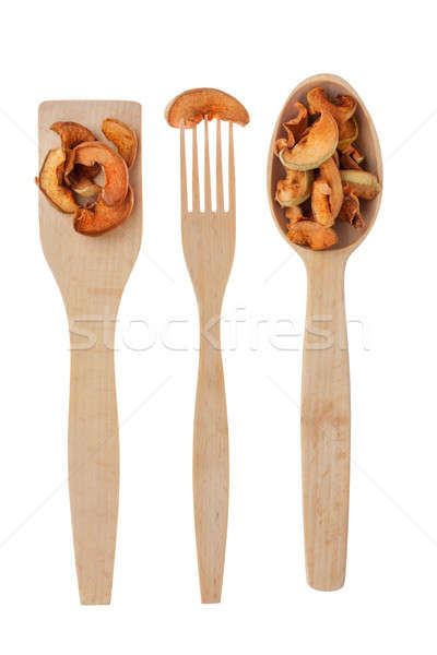 Wooden spoon, fork, paddle with  dried apple Stock photo © alekleks