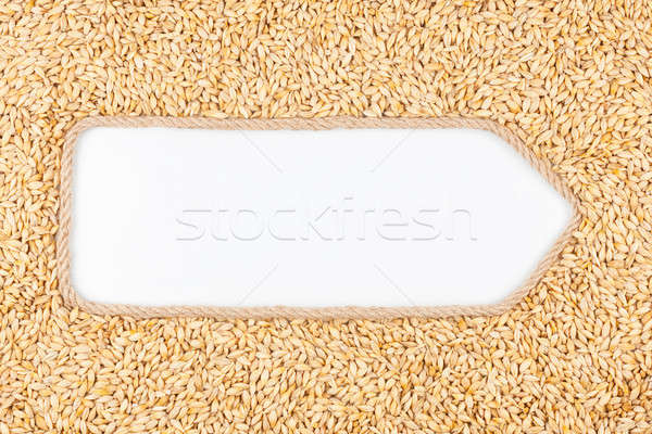 Arrow made of rope  and barley  with a white background Stock photo © alekleks