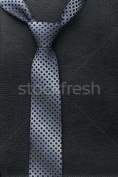 Men's tie lies on the natural leather Stock photo © alekleks